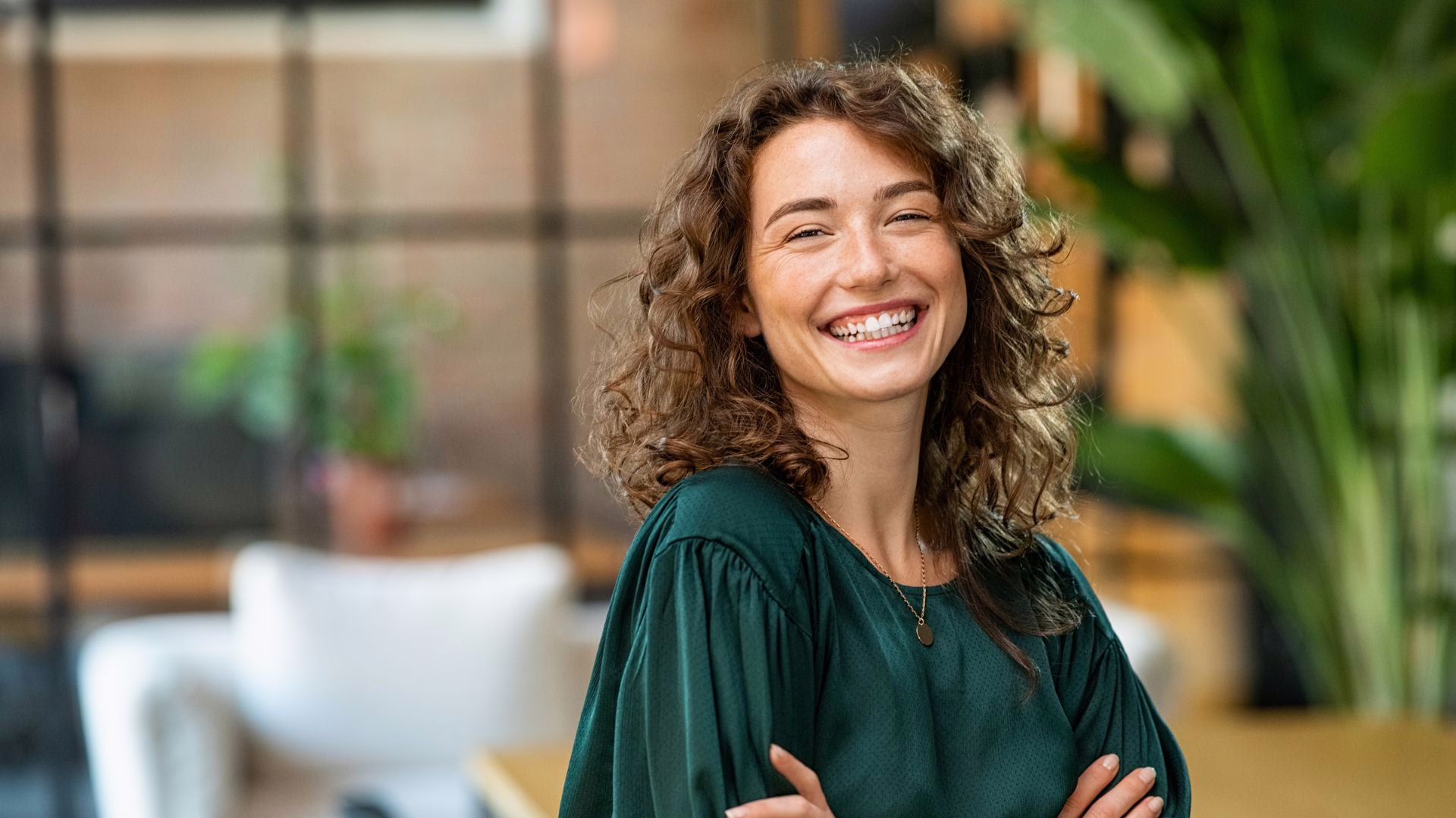 woman smiles for Orthodontic Health Month